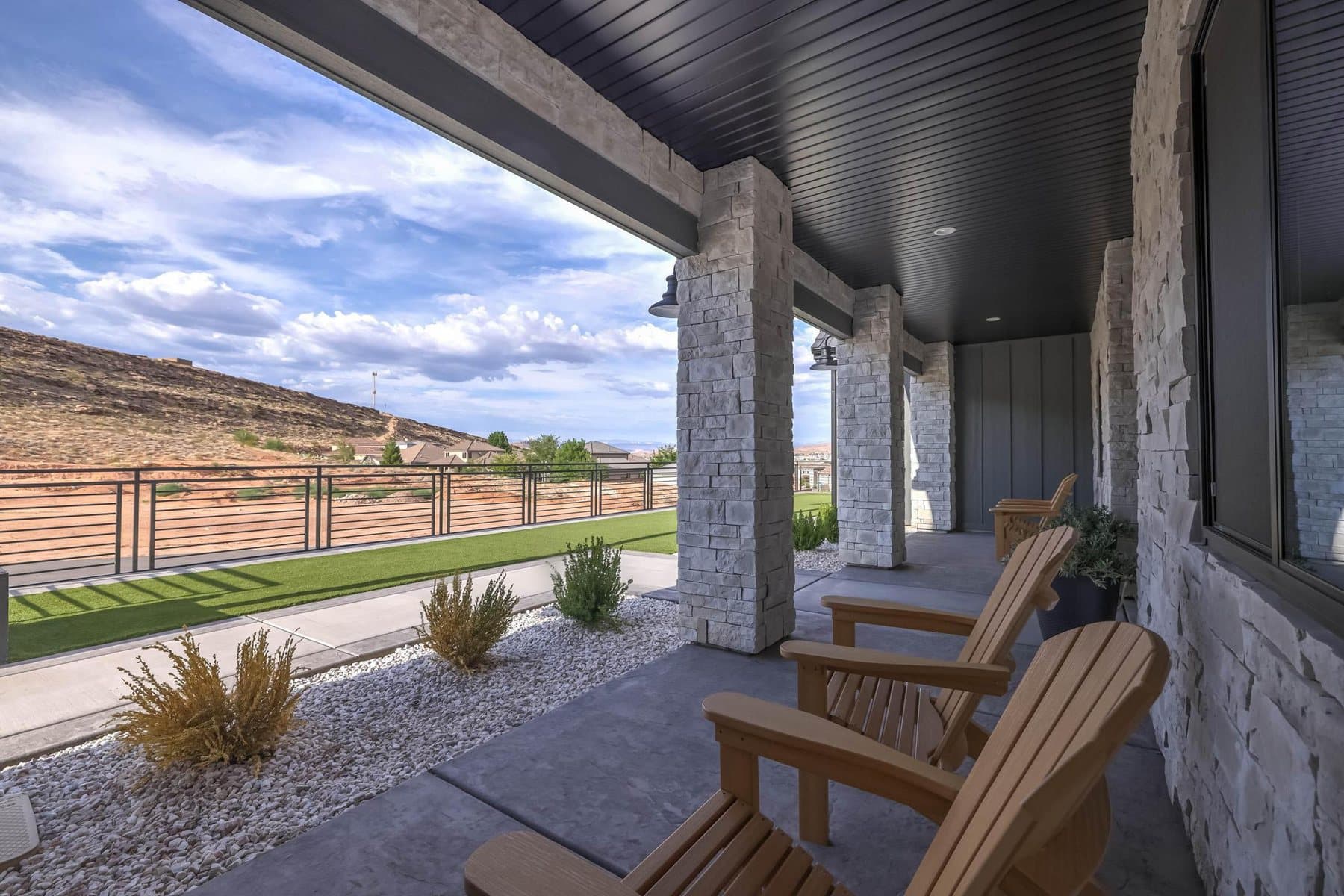 The covered patio and outdoor BBQ kitchen