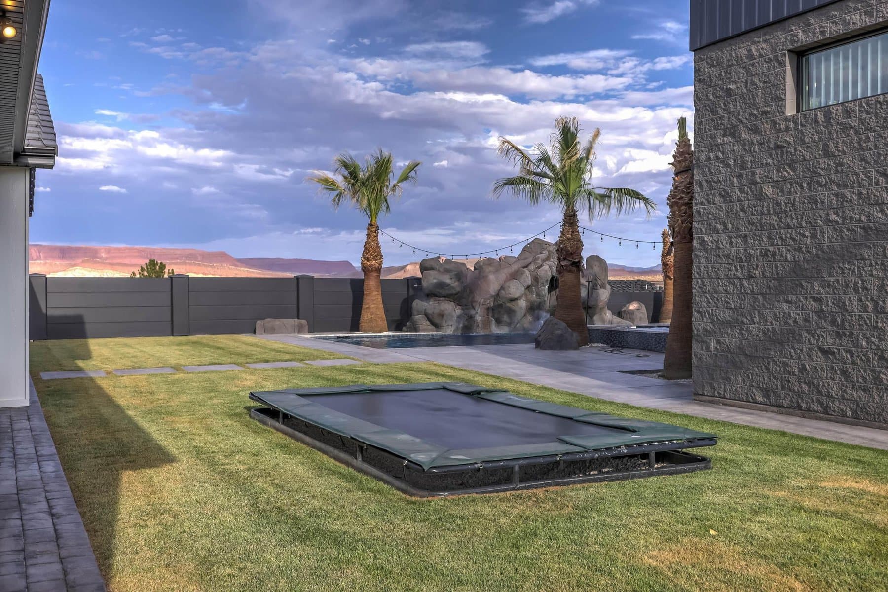 The in-ground trampoline set into the lawn
