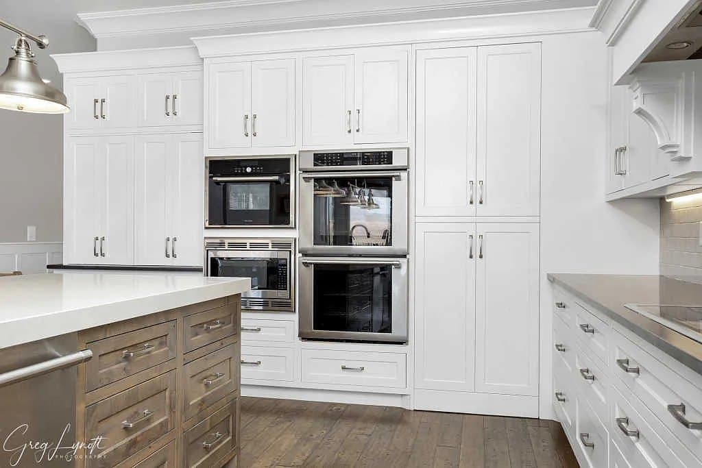 The kitchen — double ovens and full-height cabinetry
