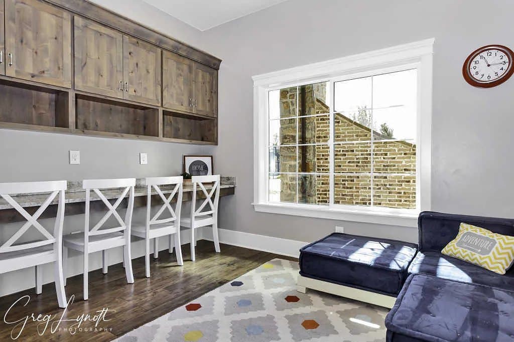 The bonus room, built-in desks along the window