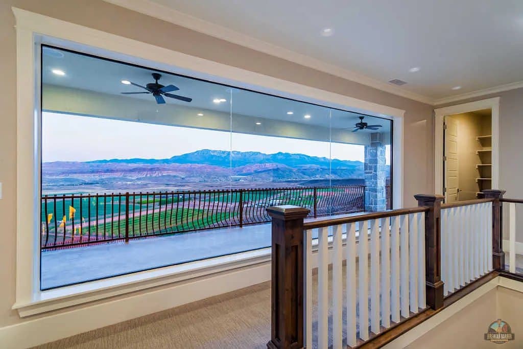 The covered deck, valley and fields below