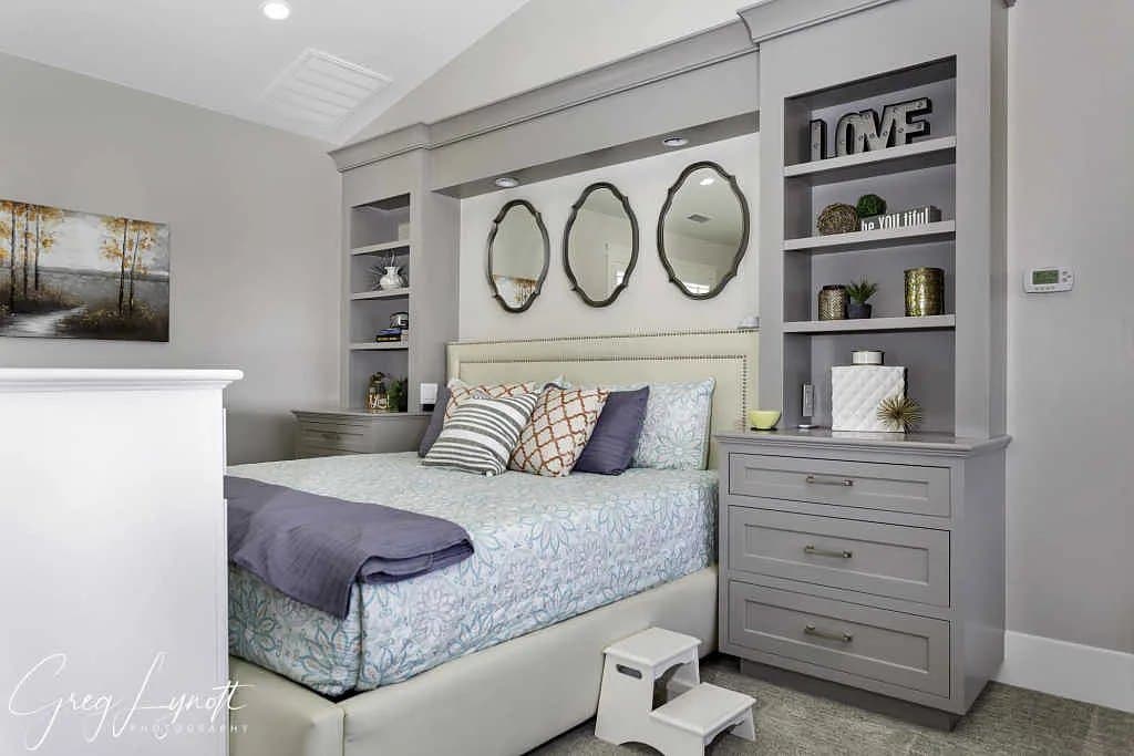 The primary bedroom, built-ins either side of the bed