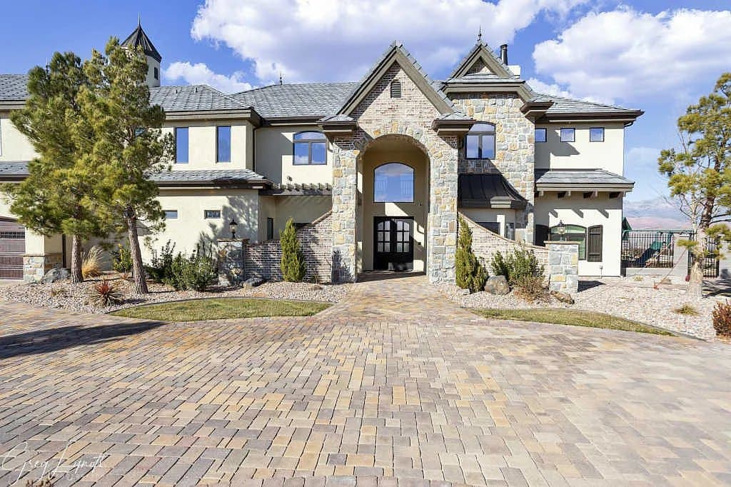 The front elevation and paver motor court