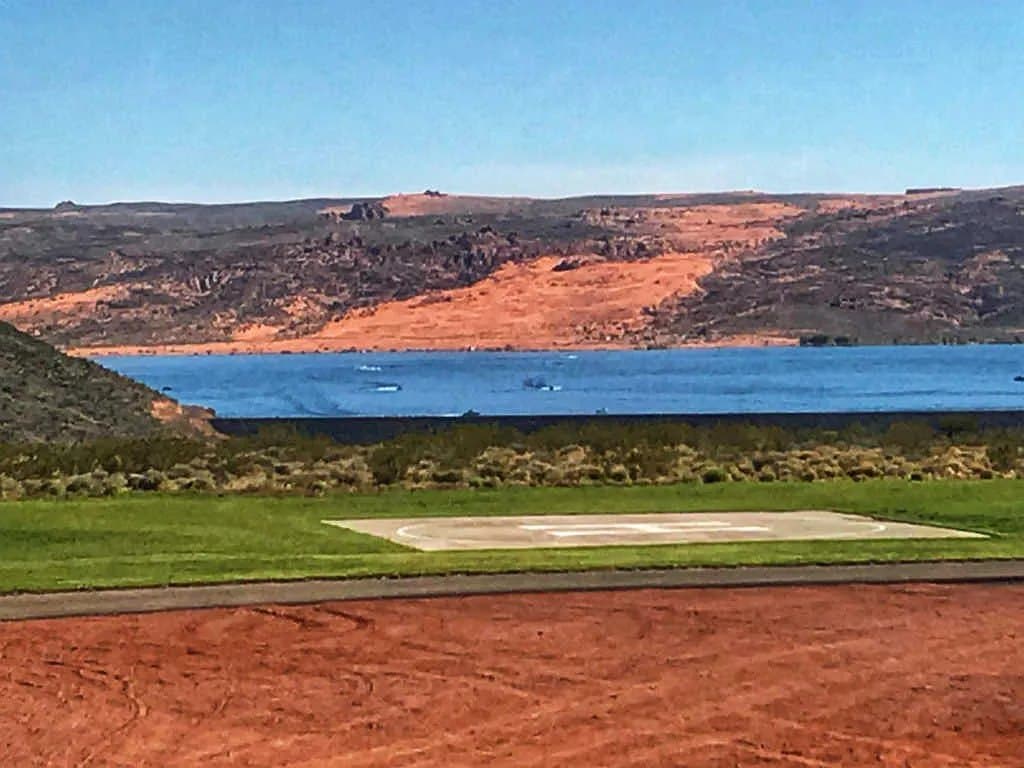 The helipad on the lawn, Sand Hollow and the red rock beyond