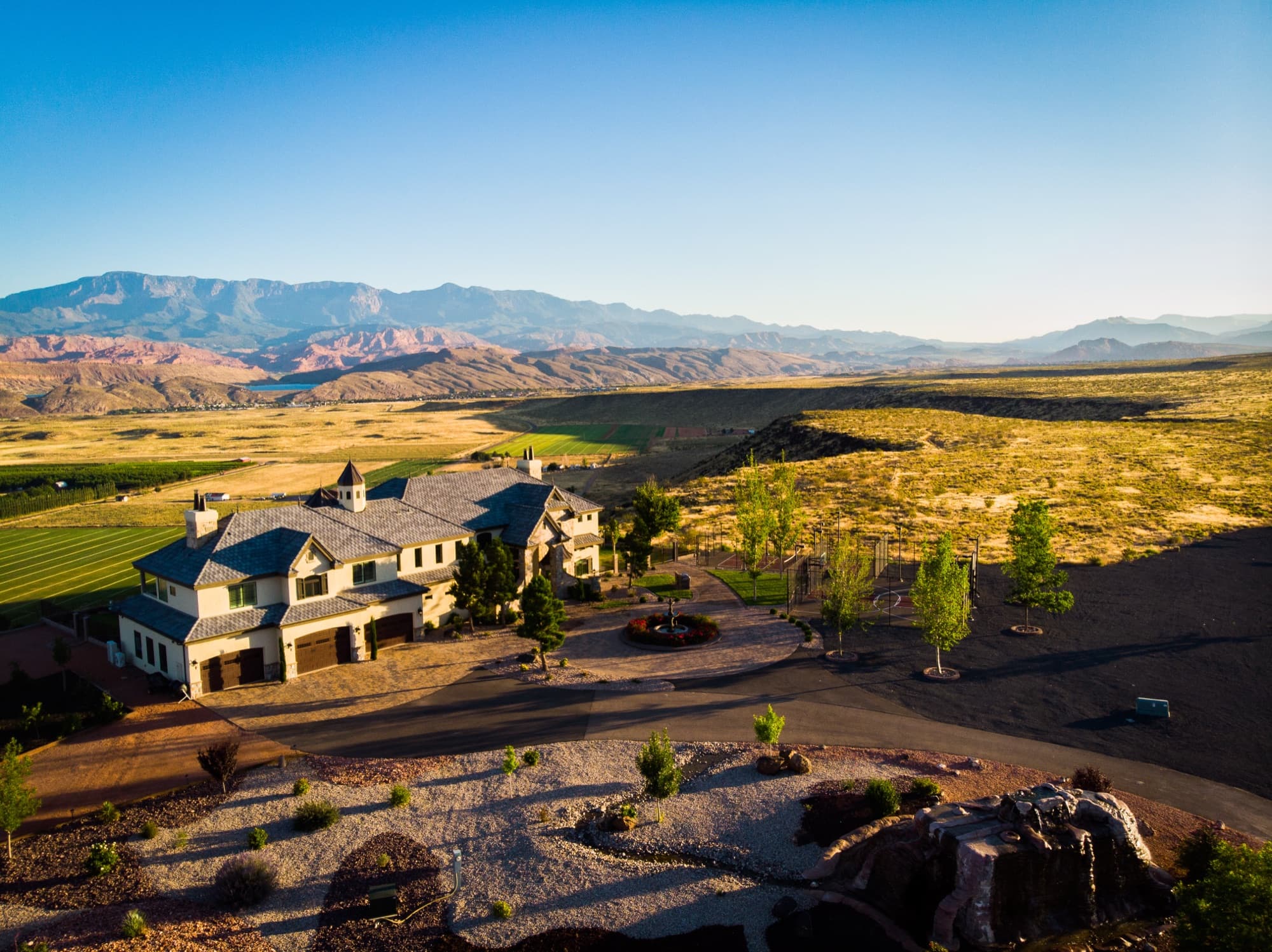 The estate above the Hurricane fields, with Sand Hollow and the red rock beyond