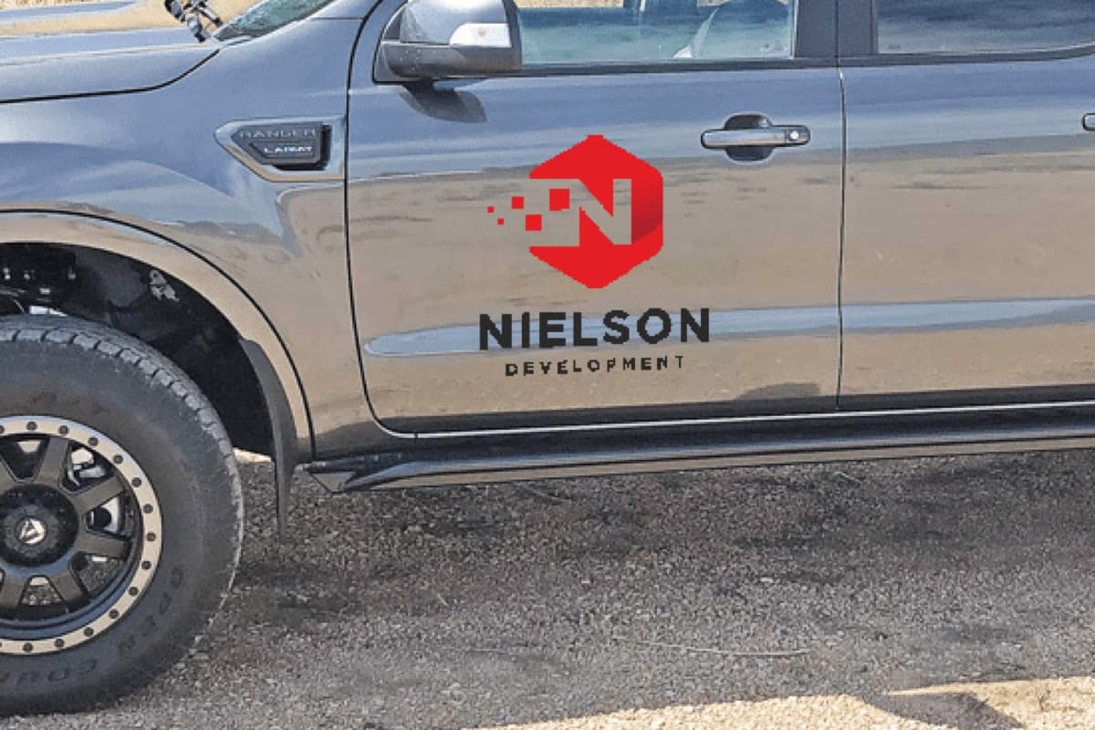 A Nielson Development work truck on a job site